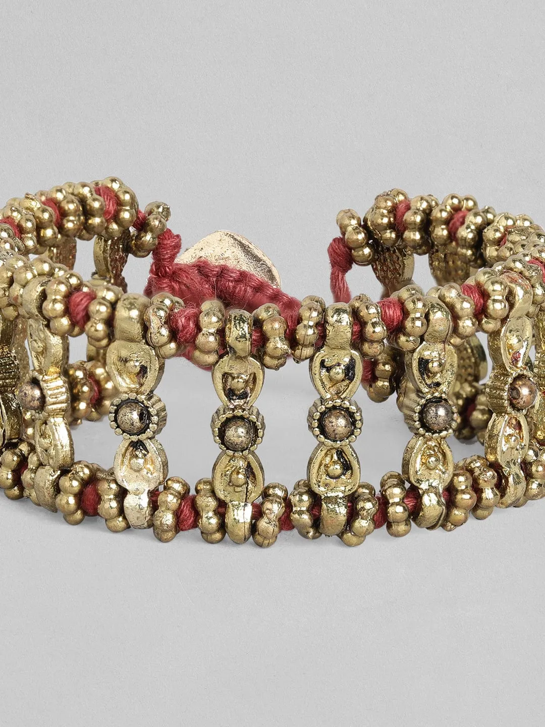 Rubans Voguish Antique Polished Red coloured Bracelet.